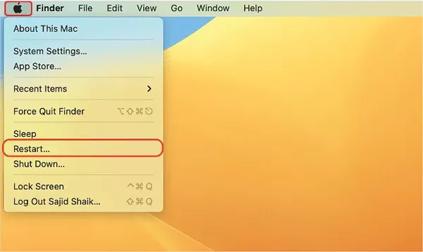 Auf dem Mac auf Neustart klicken